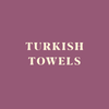 Turkish Towels - A stack of assorted Turkish Towels