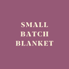 Blankets - A box with a mustard colour Mosaic blanket in it